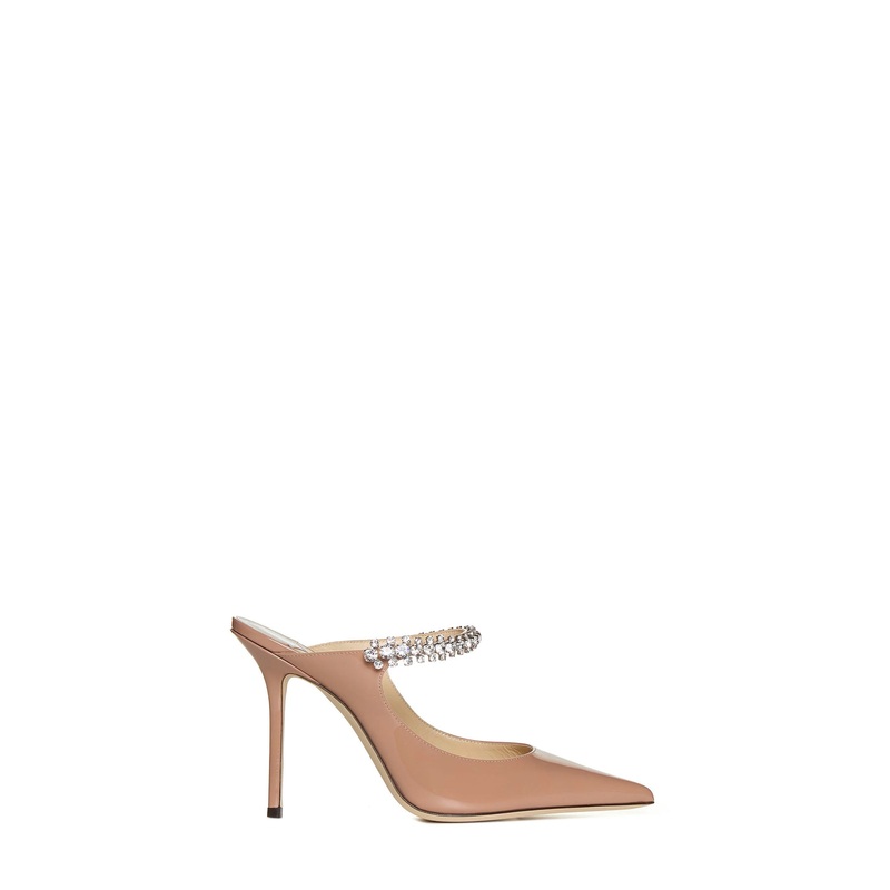 Pastel pink patent leather mules with crystal strap