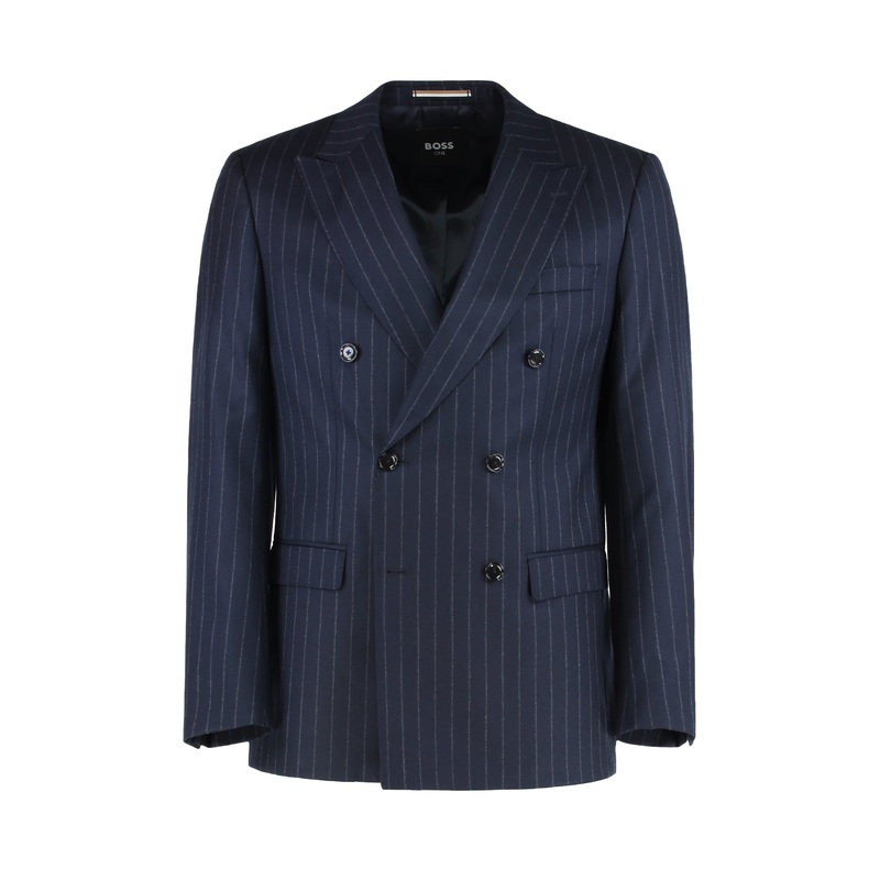 I WEAR A SLIM FIT TWO-PIECE SUIT MADE OF VIRGIN WOOL.