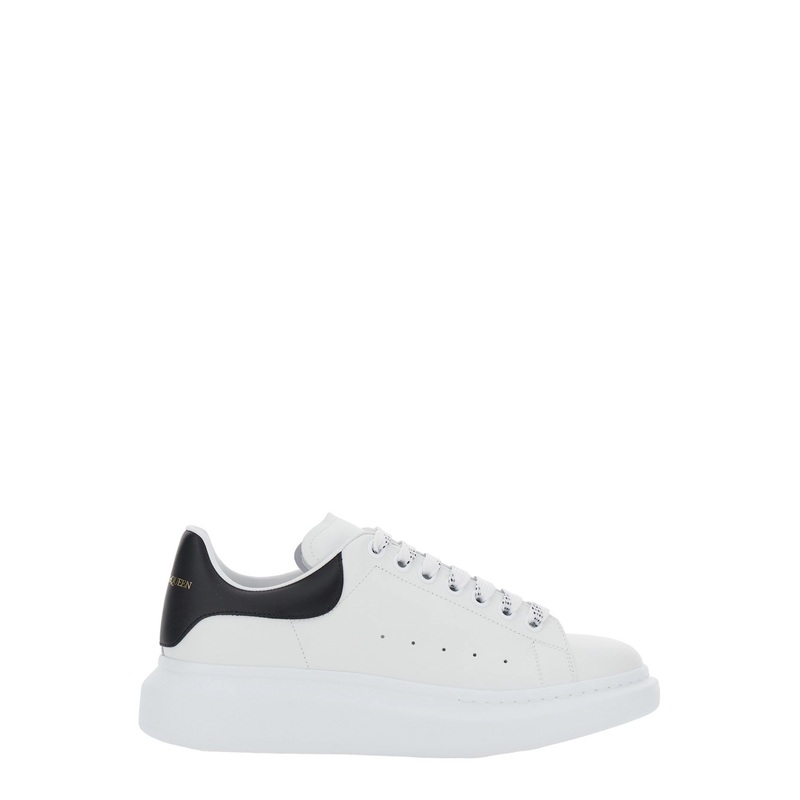 Black and White Low Top Sneakers with Logo Lettering on Tongue and Contrasting Heel in Leather Man