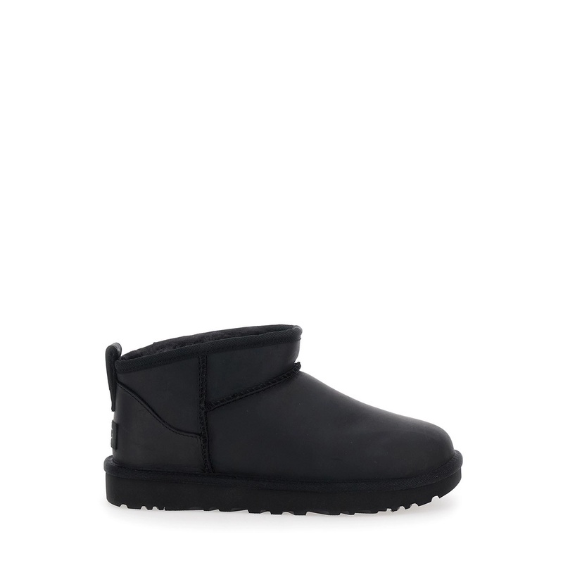 ‘Classic Ultra Mini’ Black Ankle Boots with Shearling Lining in Leather Woman