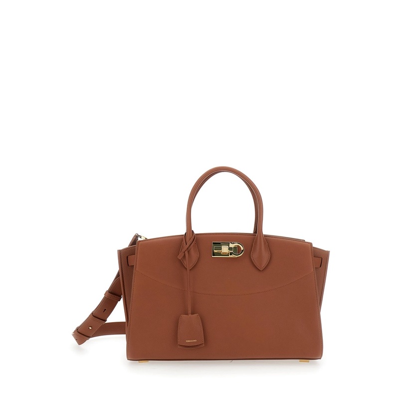 Brown Handbag with Adjustable and Removable Shoulder Strap and Gancini Turn-Lock Closure in Grained Leather Woman
